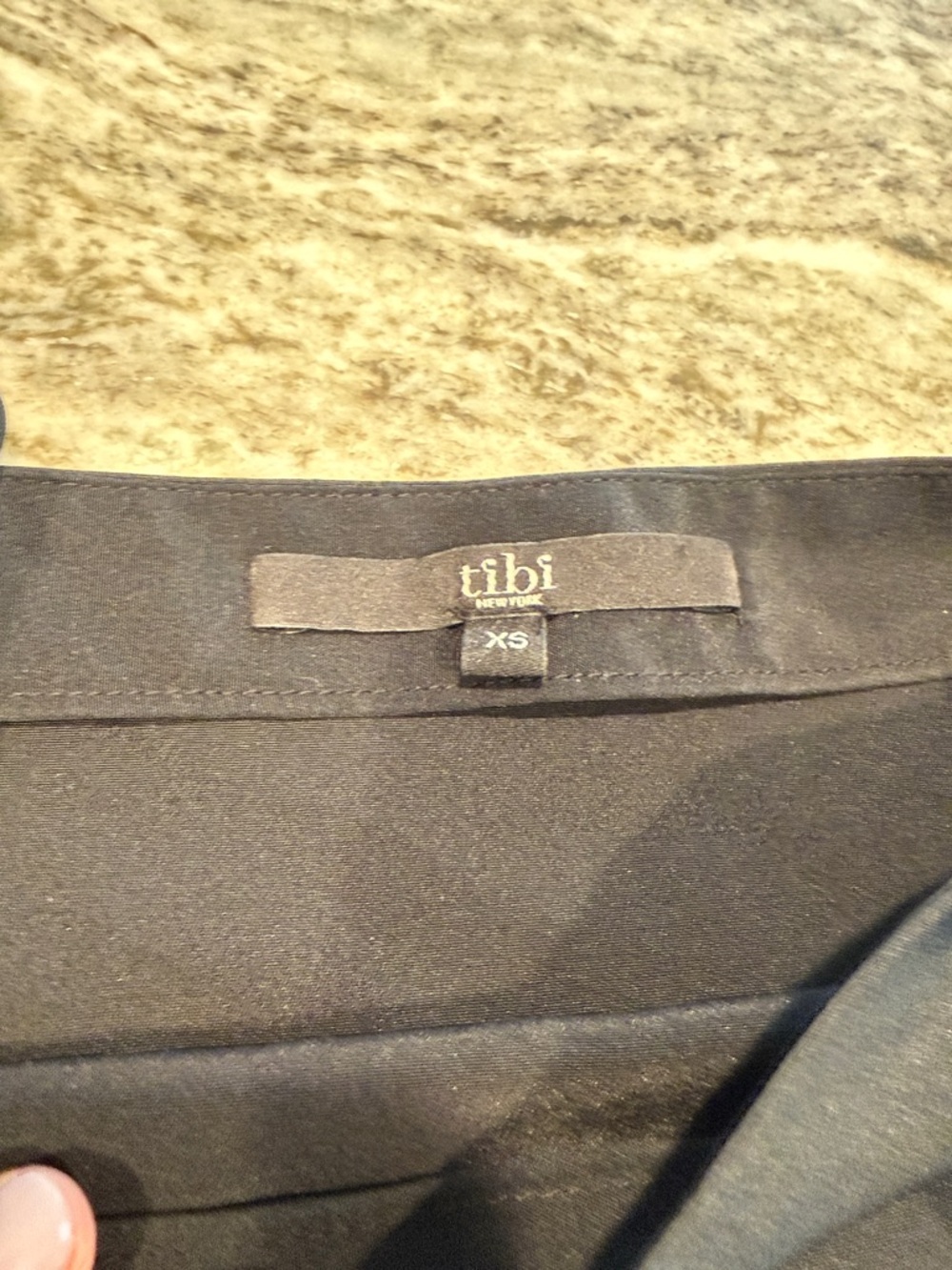 Tibi Black silk blouse.  Luxurious feel with silk ties at the wrist-